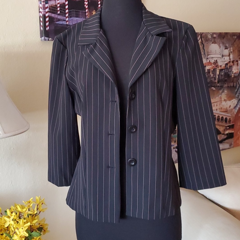 Black and pink pin stripe suit